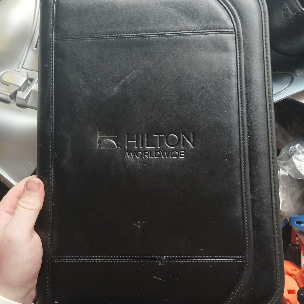 Hilton Worldwide Black Leather Business Portfolio